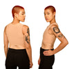 Side view and rear view of a model showing off the Nude No. 3 half binder, looking over the shoulder with hand on hip.